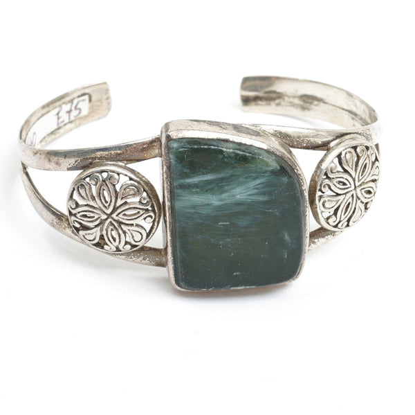 Silver bracelet with green stone